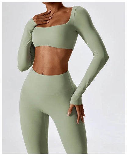 Person wearing a green athletic outfit on a white background